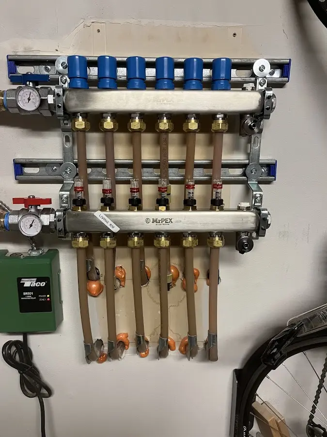 Plumber performing Water Heater Repair at a residential property in Penn Yan